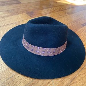 A New Day hat with ribbon brim.